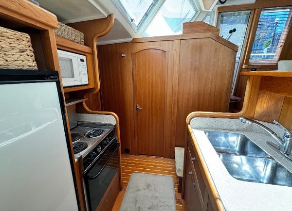 2002 Mainship 430 Aft Cabin Photo 31 sur 55